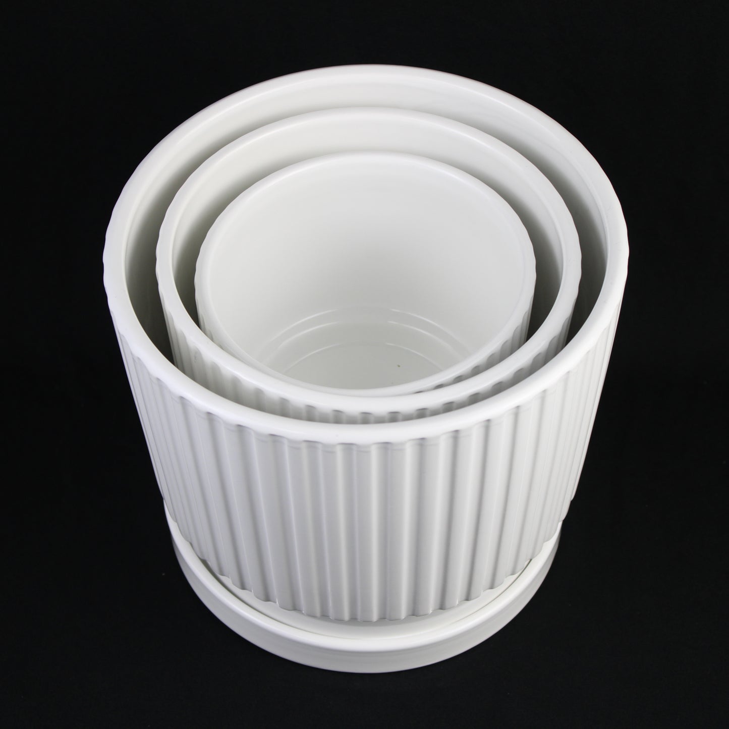 3-Piece White Ceramic Planter Pot Set with Vertical Ribbed Design & Saucers