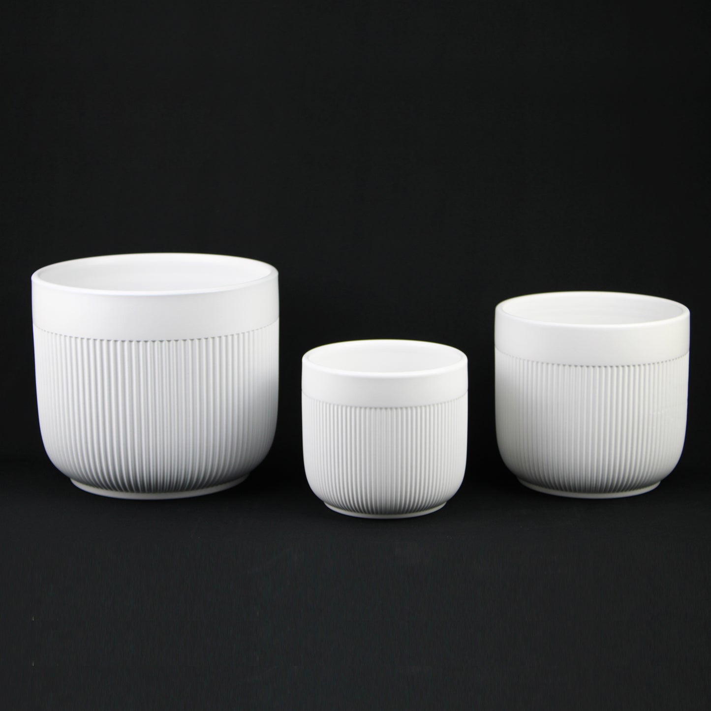 3-Piece White Stoneware Planter Pot Set with Vertical Line Texture